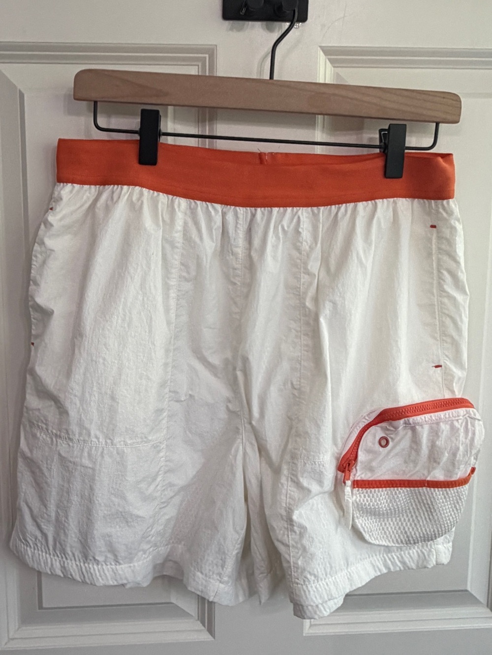 Great condition size M White Shorts with Orange details and great pockets! Beach